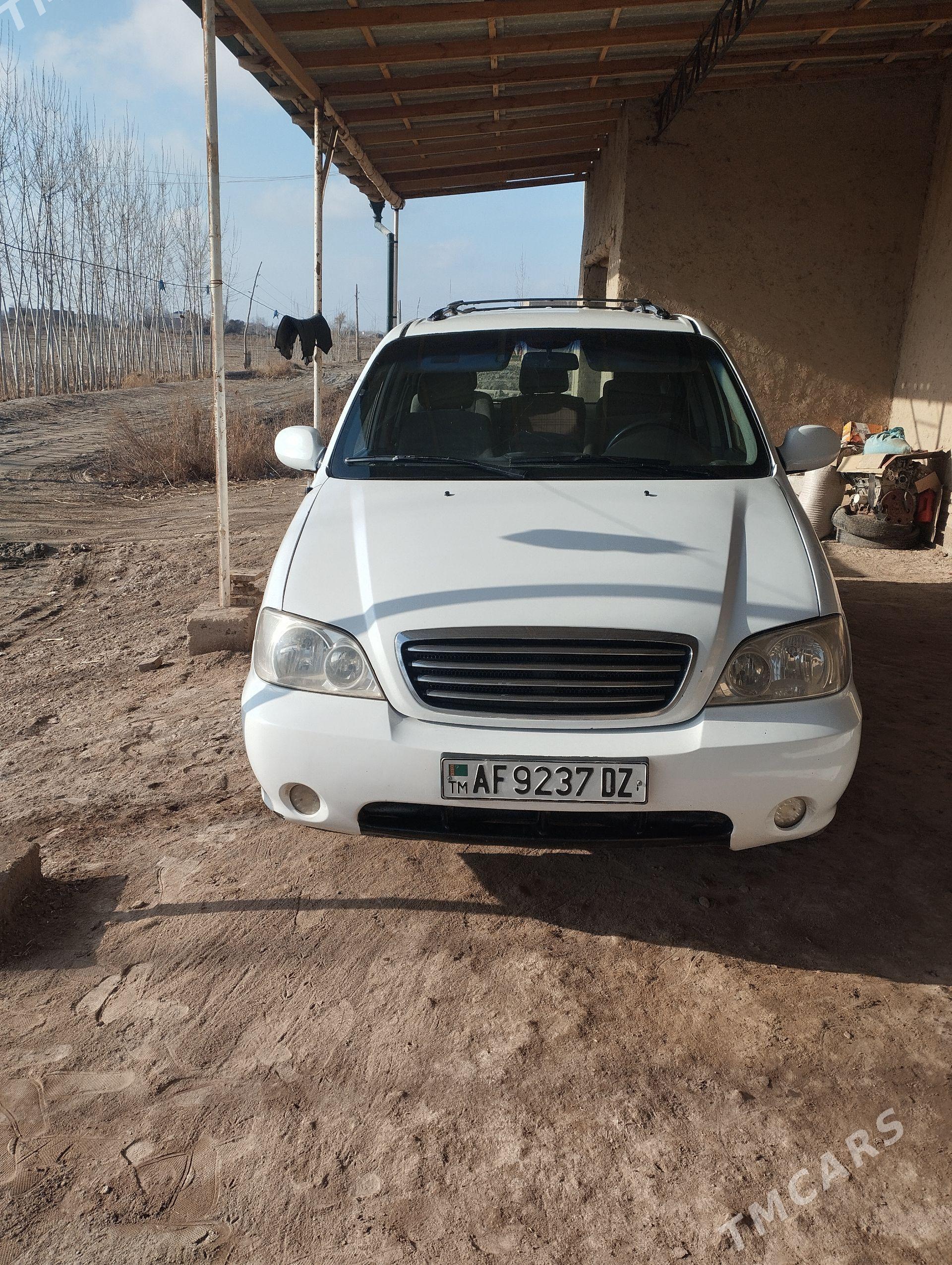 Kia Carnival 2001 - 68 000 TMT - Гурбансолтан Едже - img 1
