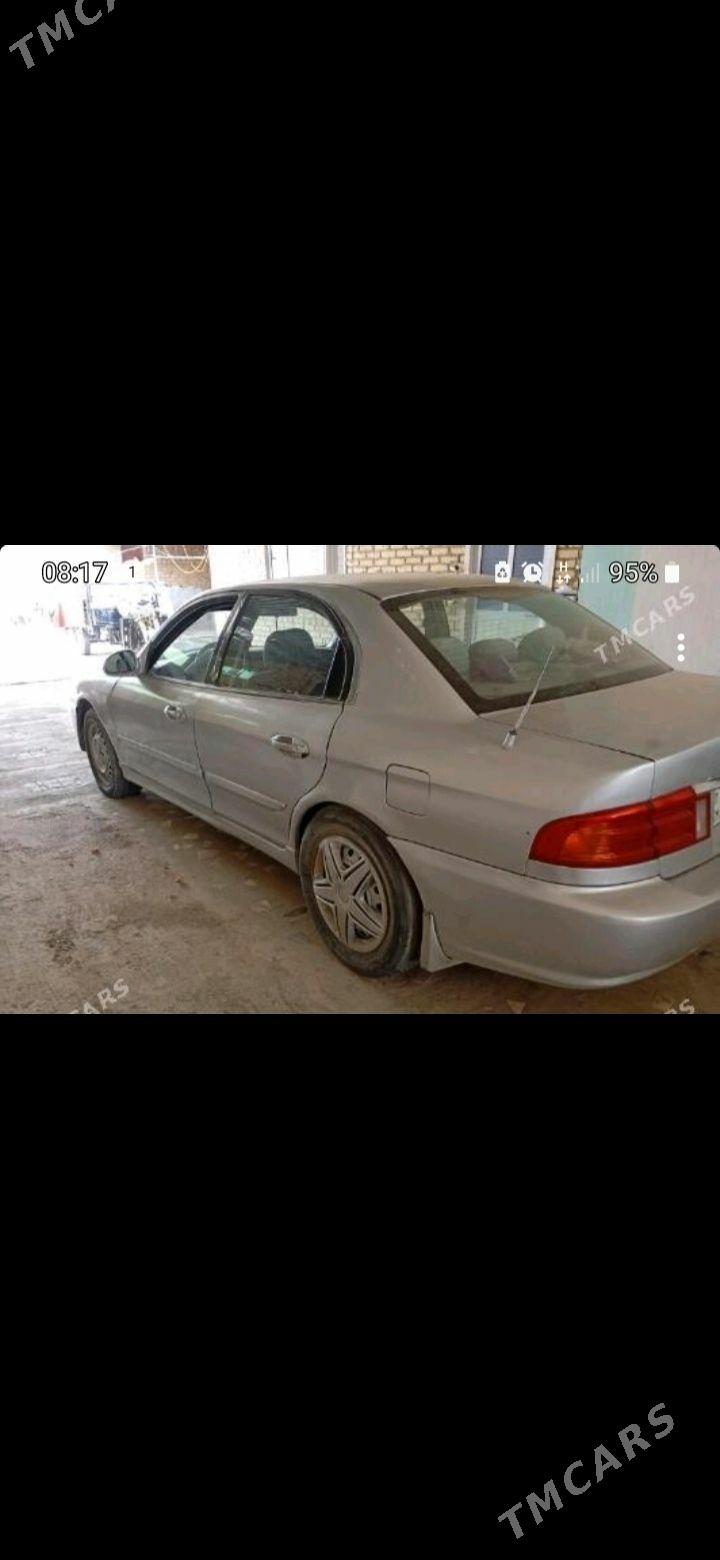 Kia Optima 2001 - 32 000 TMT - Гарабекевюл - img 1