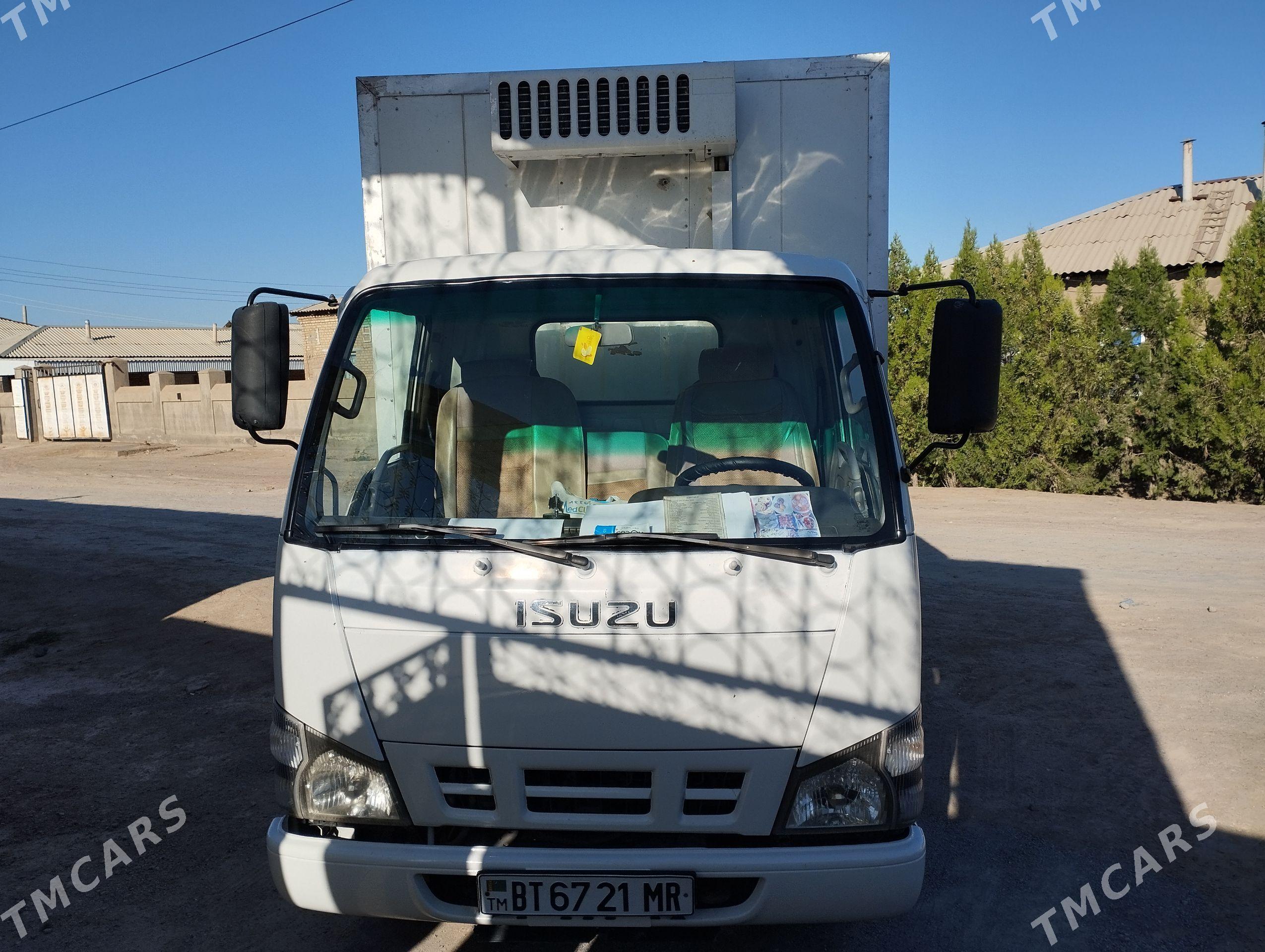 Isuzu Elf 2007 - 340 000 TMT - Байрамали - img 1
