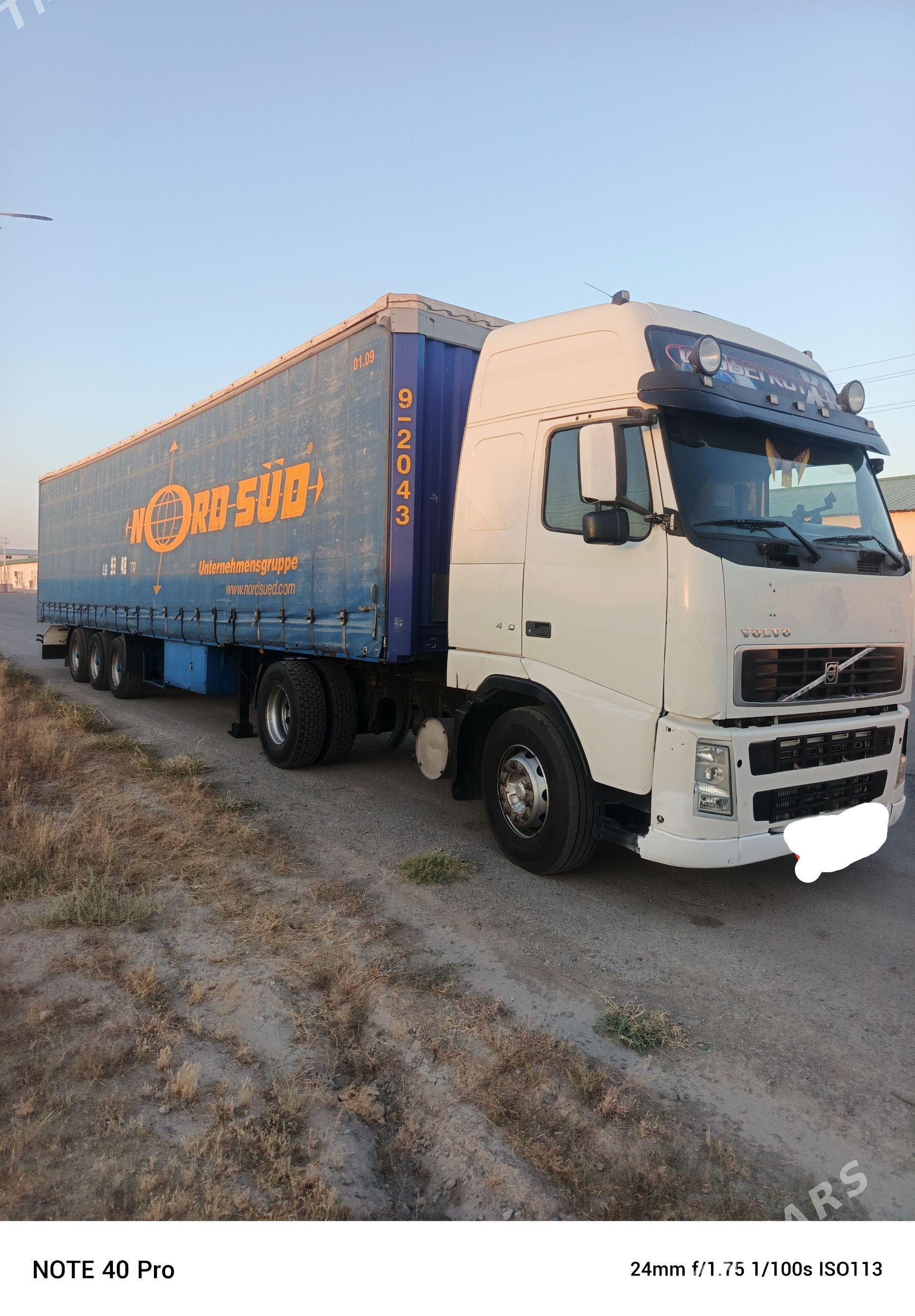 Volvo FH12 2004 - 880 000 TMT - Dänew - img 1