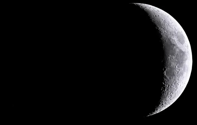 Kosmonawt seýrek kosmiki hadysany - Aý bilen Saturnyň ýakynlaşan pursadyny surata aldy
