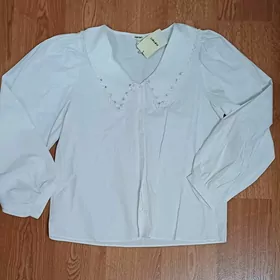 Женские блузки