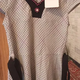 Платья