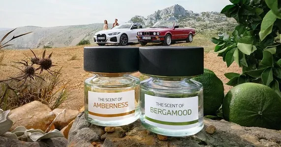 BMW выпустила духи с бутылками в форме своей штаб-квартиры в Мюнхене