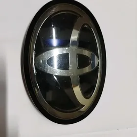 COROLLA EMBLEMA MORDA