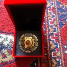 Kümüş broşka