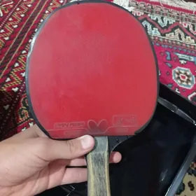 Stol tennis raketga