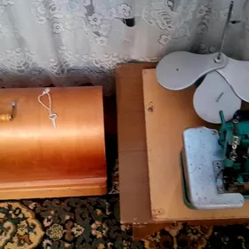 швейная машинка оверлок tikin