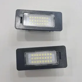Освещение номерного знака