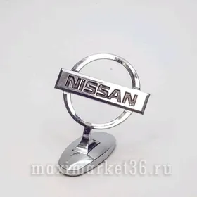 Nissan kapot emblema