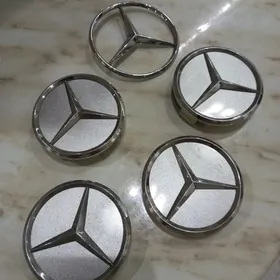 Колпачки и значок Мерседес