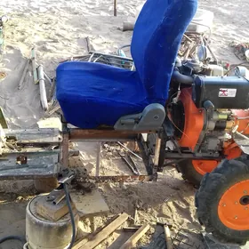 ýer süryän traktor