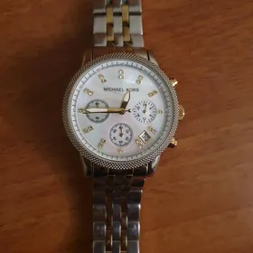 Michael Kors часы sagat