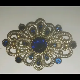 серебряная брошь