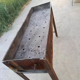 Şaşlik bişiriliyan Mañgal