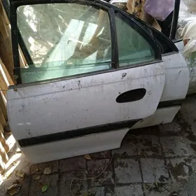 Двери омега б