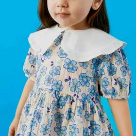 Çaga köýnek tikýan