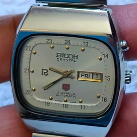 Sagat Часы Ricoh.