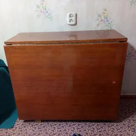 Стол–ту́мба