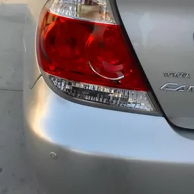 Тойота Камри фара