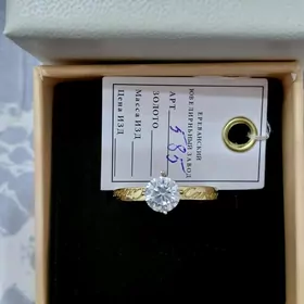 Золотое колечко от Картьер