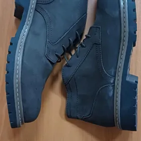 Новые кожаные ботинки