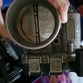 drossel zaslonka passat 2012