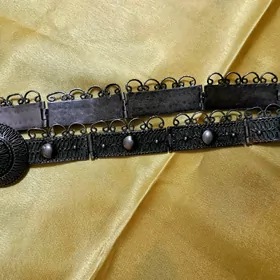 Стариный металлический пояс.