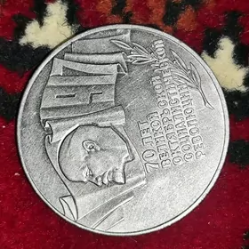 Монета teññe