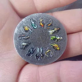 мидальён из серебра,са знаками