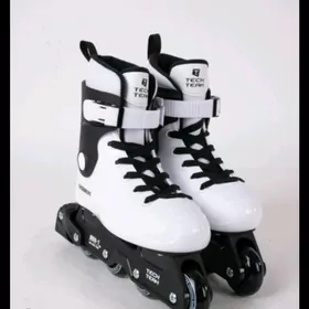 Роликовые коньки