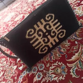 койнек кастюм сумка