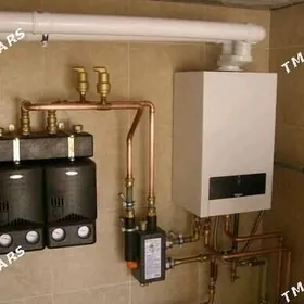 Komby Santehnik we elektrik