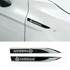 NISSAN ýazgyly krylo emblema