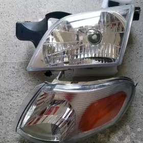 Фара поворотник