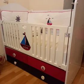 детская качающаяся кровать