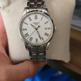 Часы Tissot и часы Romanson