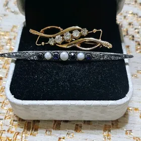 золотая брошь