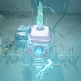 Mini  traktor  Yer süryën