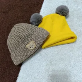 Шапки, носочки.