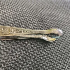 Серебряные щипцы для сахара