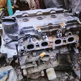 Мотор Тиида