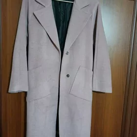 täzeje geýilmedik palto