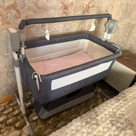 детская кроватка и люлька-яйцо