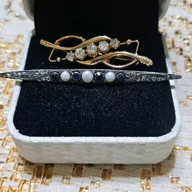 золотая брошь