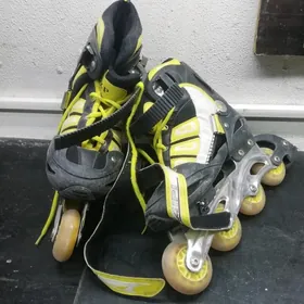 Коньки роликовые