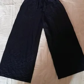 Брюки, сумка, воск