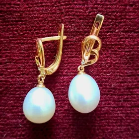 золотые серьги с жем