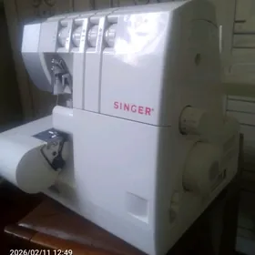 singer owerlok hem tikis