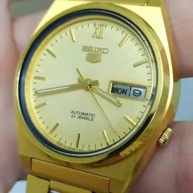 Sagat Часы Seiko позолоченные